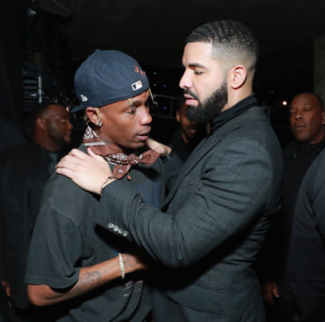 Drake Shoots Giant Travis Scott Head During “Meltdown” Performance